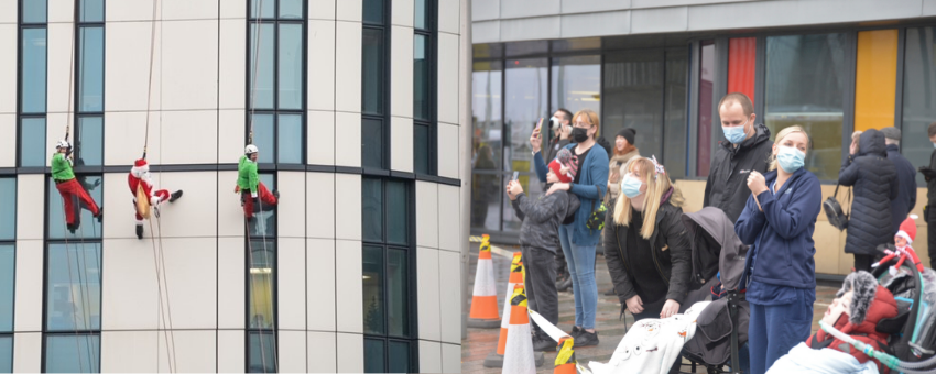 Photo of Santa abseiling down the Royal Hospital for Children