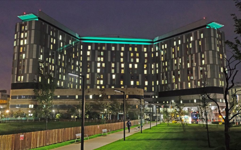 Exterior of Queen Elizabeth University Hospital at night