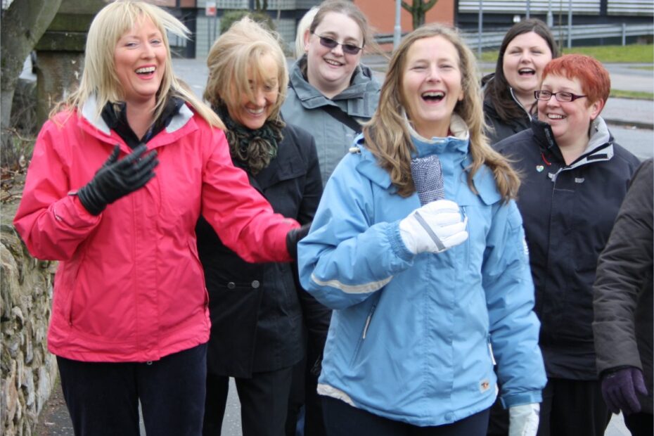 Group of women in a walking group, laughing
