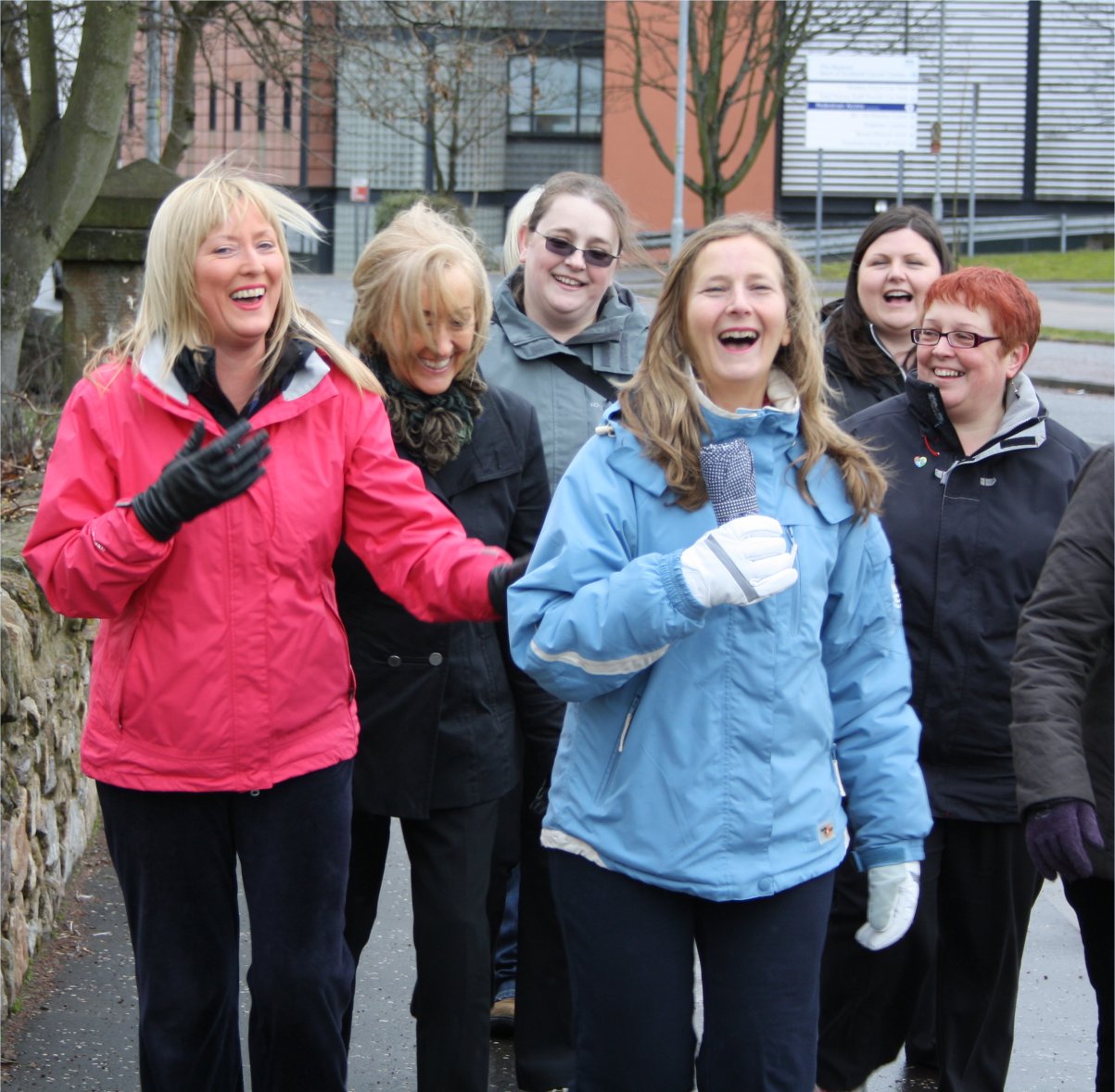 Group of women in a walking group, laughing