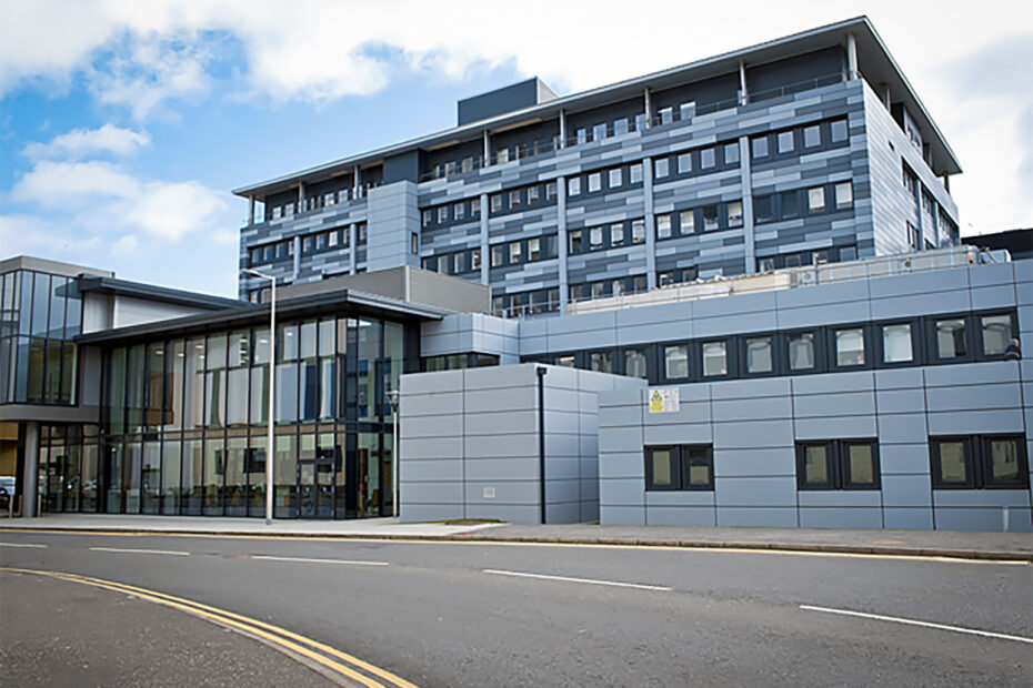 Front view of the INS surgical building based within the QEUH campus.