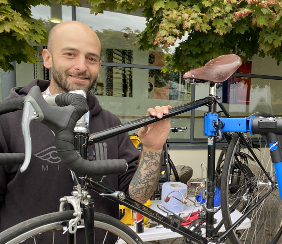 Active Travel Officer Claudia Pia working on a bike