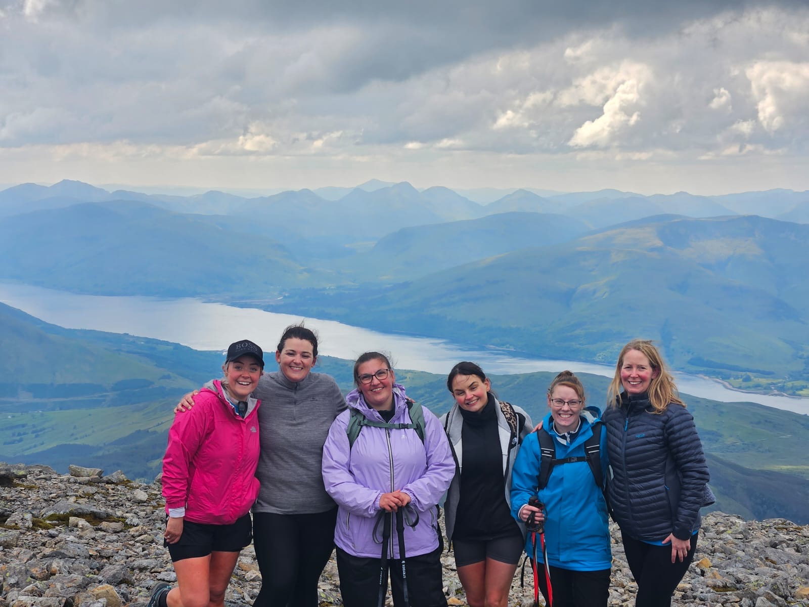 Nurse supported by colleagues during Ben Nevis challenge