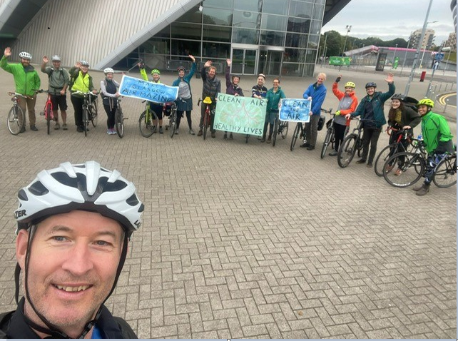 A group of cyclists from NHSGGC at the Clyde Auditorium in Glasgow during a cycle round the city.