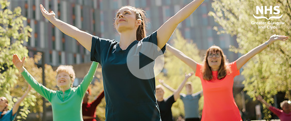 Dancers performing outside the QEUH, during filming for the Healing Arts Scotland video.