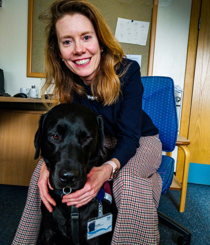 Hearing Dog Cooper with his owner, Dr Helen Grote