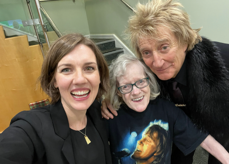 Dr Aine Kennedy, Harriet Rozanski and Rod Stewart pictured smiling together during their meeting at Celtic Park